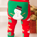 Red and green Christmas-themed leggings with a snowman design and 'Blade & Rose' branding.