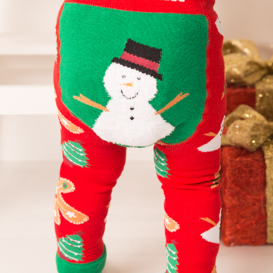Red and green Christmas-themed leggings with a snowman design and 'Blade & Rose' branding.