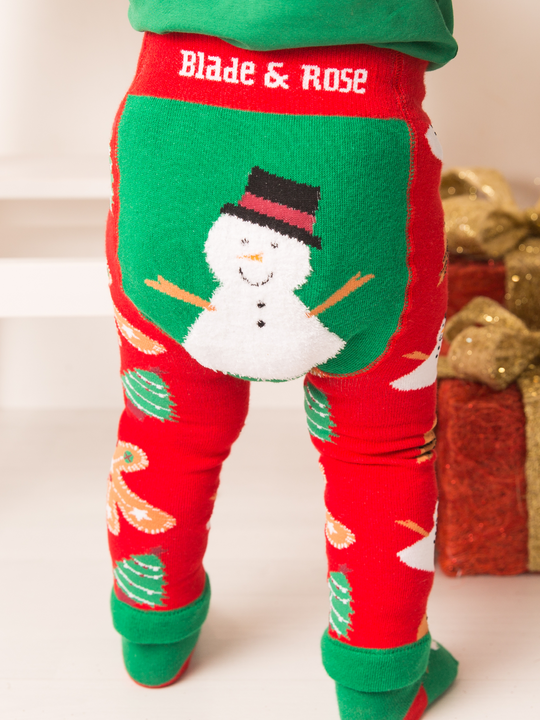 Red and green Christmas-themed leggings with a snowman design and 'Blade & Rose' branding.