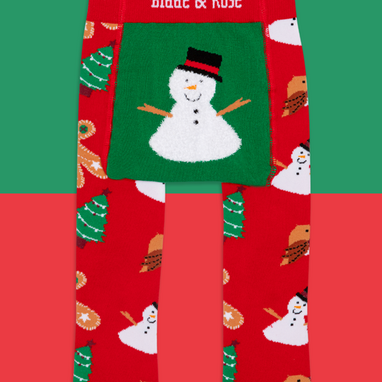 Red leggings with snowman pattern and 'Blade & Rose' branding on a green and red background